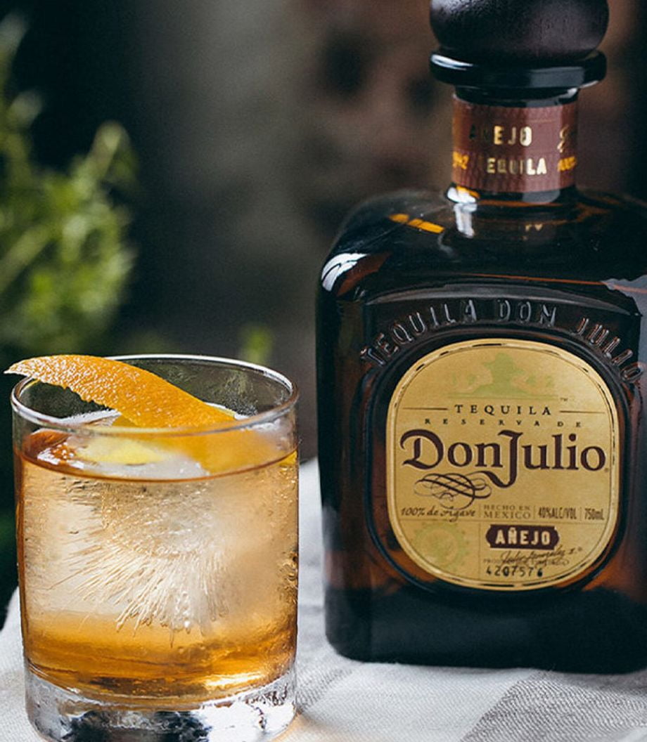 don julio anejo tequila bottle with glass