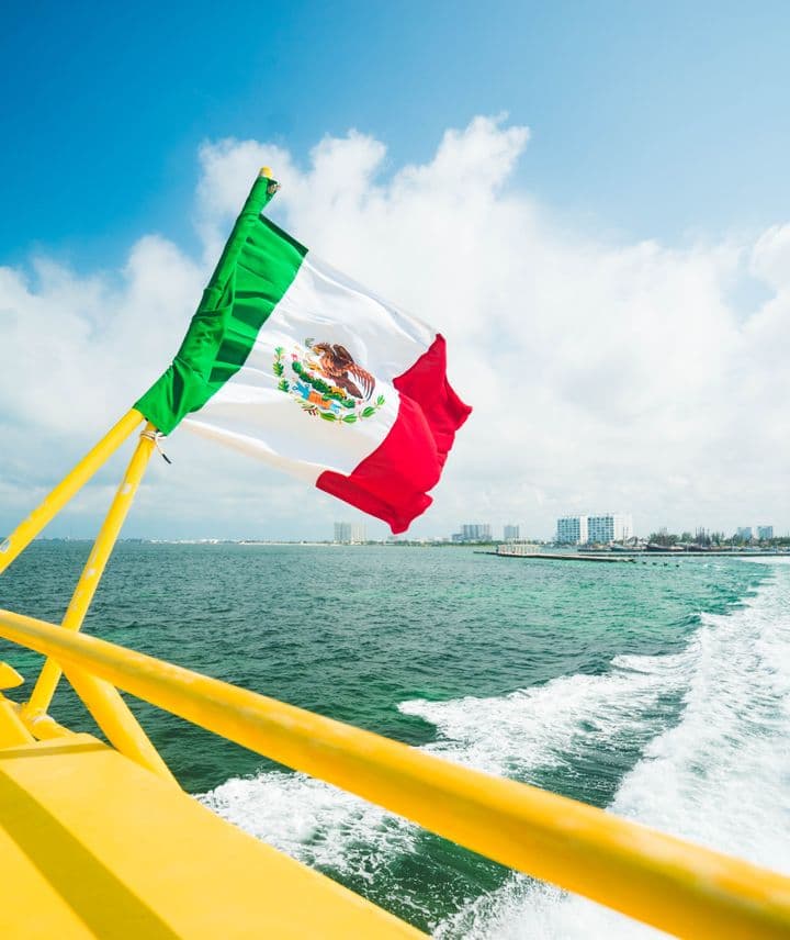 Boat on the river with Mexico Flag 