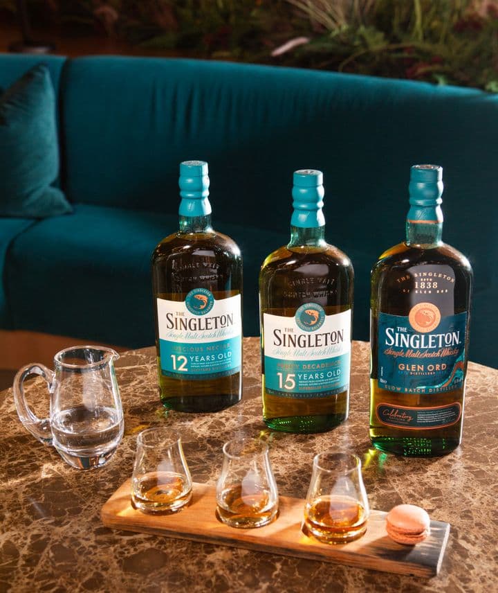 Tres botellas de whisky The Singleton en una degustación.